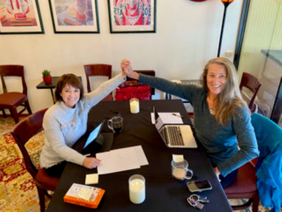 Cheryle and Beth celebrating together at a working session